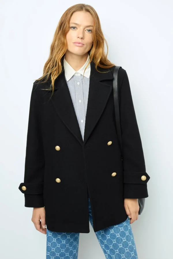 Shop Flared jeans with monogram - ANNA Coats